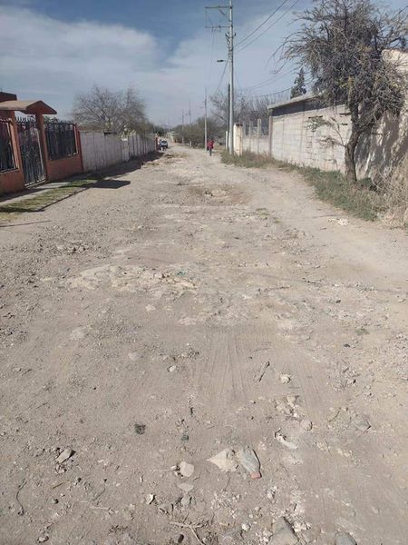 Postergan pavimentación de calle Las Malvas