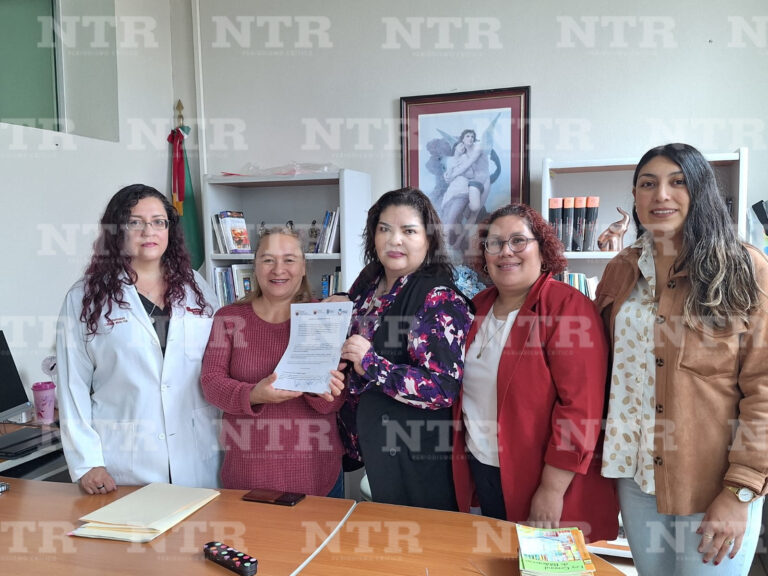Firman convenio bibliotecas y escuela de restauración