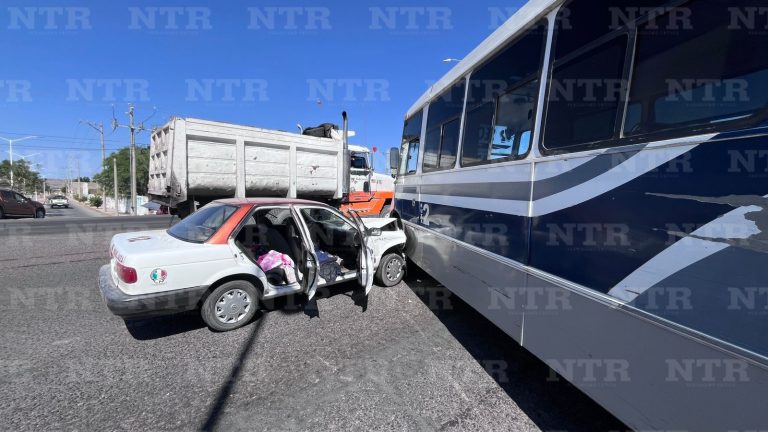Choque entre camión y taxi deja un lesionado